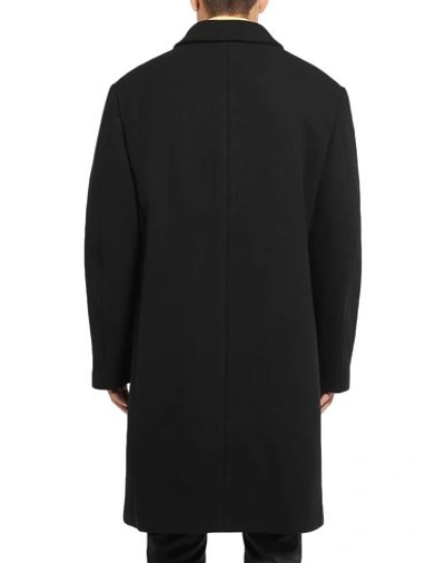 Shop Raf Simons Coats In Black