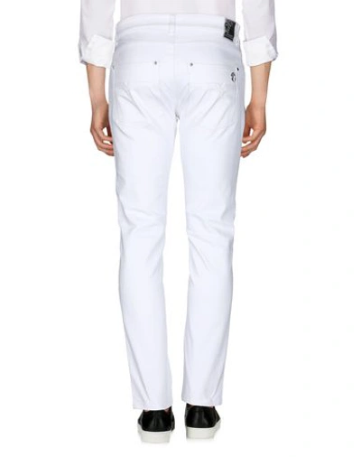 Shop Versace Denim Pants In White