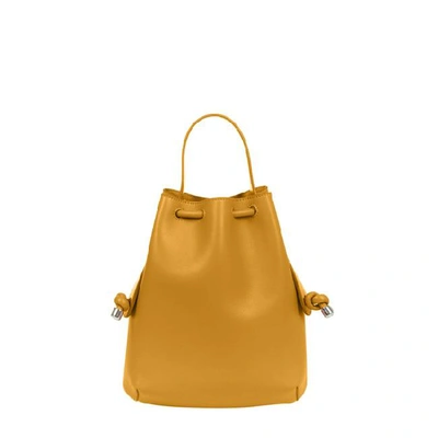 The Briony Backpack encloses its drawstring silhouette with