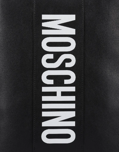 Shop Moschino Leather Clutch Backpack In White