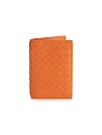 Shop Bottega Veneta Eight-slot Leather Cardholder In Burned Orange