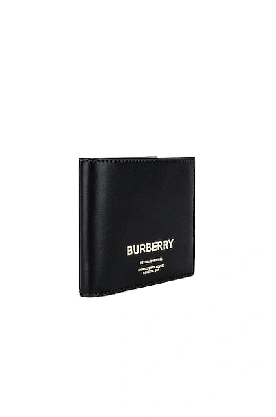 Shop Burberry Billfold Print Wallet In Black