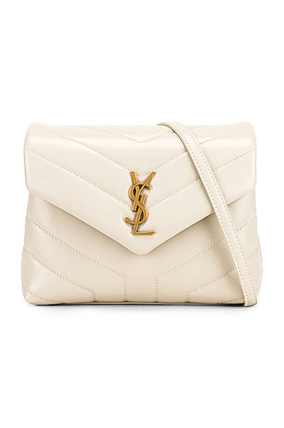 Shop Saint Laurent Toy Supple Monogramme Loulou Strap Bag In White. In Crema Soft