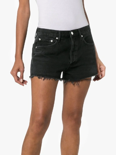 Shop Agolde Parker Frayed Denim Shorts In Black