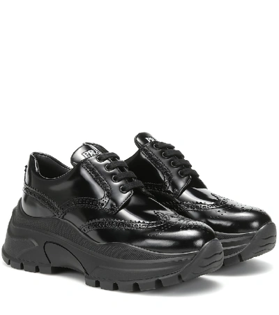 Shop Prada Leather Sneakers In Black