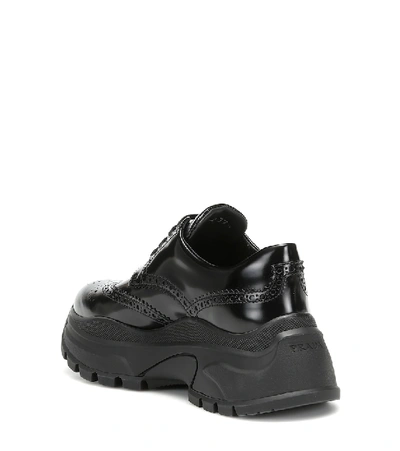 Shop Prada Leather Sneakers In Black