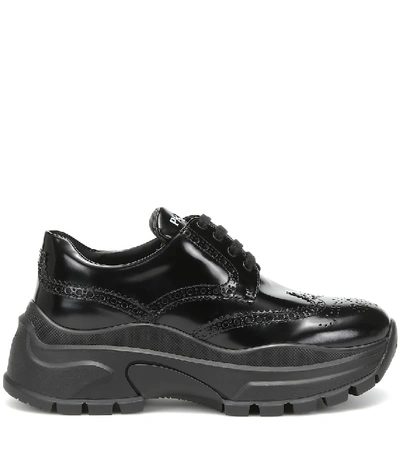 Shop Prada Leather Sneakers In Black