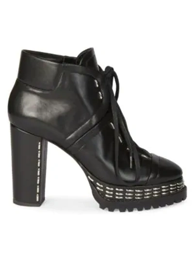 Shop Alaïa Women's Studded Leather Platform Ankle Boots In Black