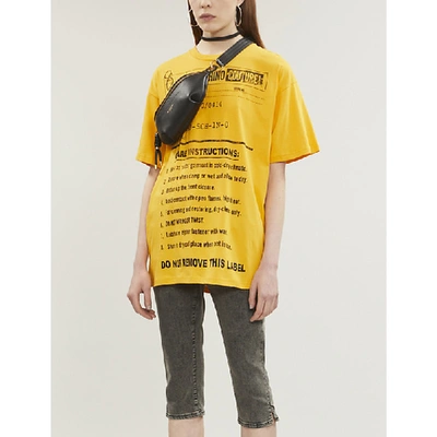 Shop Moschino Care Label-print Cotton-jersey T-shirt In Orange