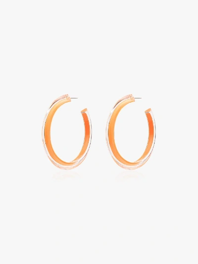 Shop Alison Lou Orange Jelly Medium Hoop Earrings