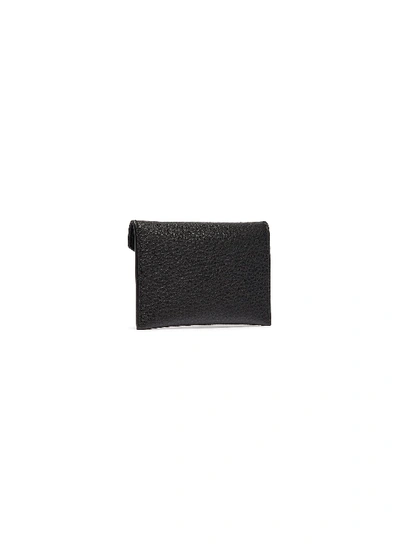 Shop Alexander Mcqueen Skull Charm Leather Envelope Card Holder In Black