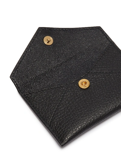 Shop Alexander Mcqueen Skull Charm Leather Envelope Card Holder In Black