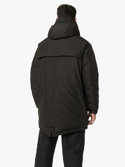 Shop Moncler Charnier Logo Parka Coat In Black