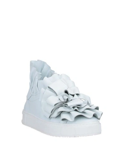 Shop Pokemaoke Sneakers In White