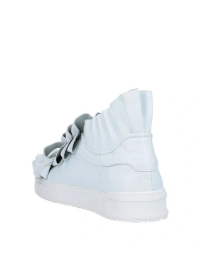 Shop Pokemaoke Sneakers In White