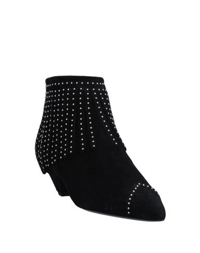 Shop Saint Laurent Ankle Boots In Black