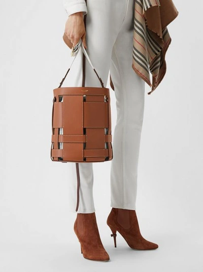 Shop Burberry Small Leather Foster Bucket Bag In Malt Brown