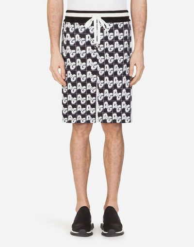 Shop Dolce & Gabbana Jersey Jogging Shorts With All-over Dg Print In Black