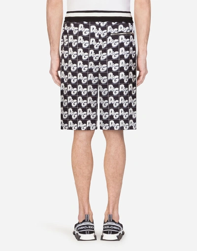 Shop Dolce & Gabbana Jersey Jogging Shorts With All-over Dg Print In Black