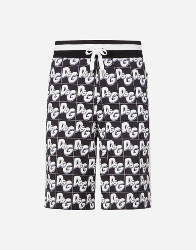 Shop Dolce & Gabbana Jersey Jogging Shorts With All-over Dg Print In Black