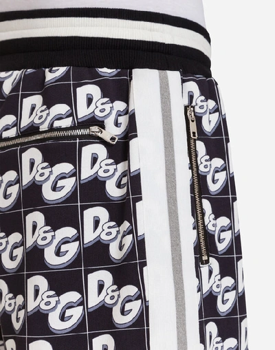 Shop Dolce & Gabbana Jersey Jogging Shorts With All-over Dg Print In Black