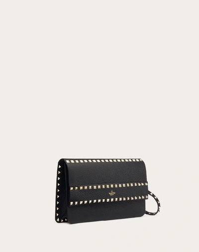 Shop Valentino Garavani Rockstud Grainy Calfskin Clutch In Black