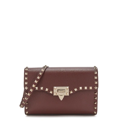 Shop Valentino Garavani Rockstud Small Leather Shoulder Bag In Burgundy