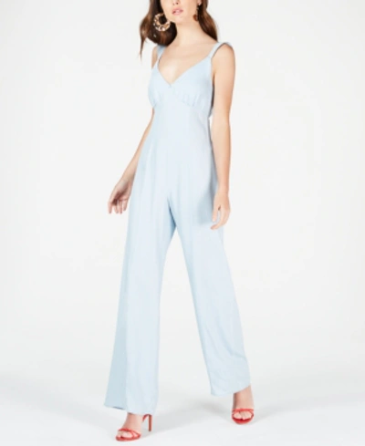 Shop Guess Ruffled Bow-back Jumpsuit In Super Bleached Wash