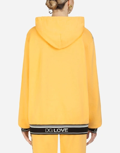 Shop Dolce & Gabbana Jersey Hoodie In Yellow