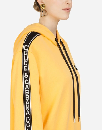 Shop Dolce & Gabbana Jersey Hoodie In Yellow