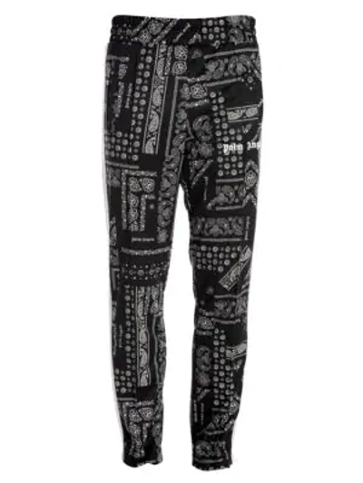 Shop Palm Angels Paisley Print Track Pants In Black White