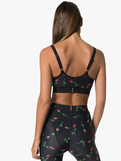 Shop Adam Selman Sport Push It Rose Print Sports Bra In Black