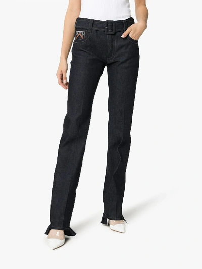 Shop Prada Belted Ruffle Hem Jeans In Blue