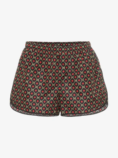 Shop Gucci Gg Star Print Swim Shorts In Black