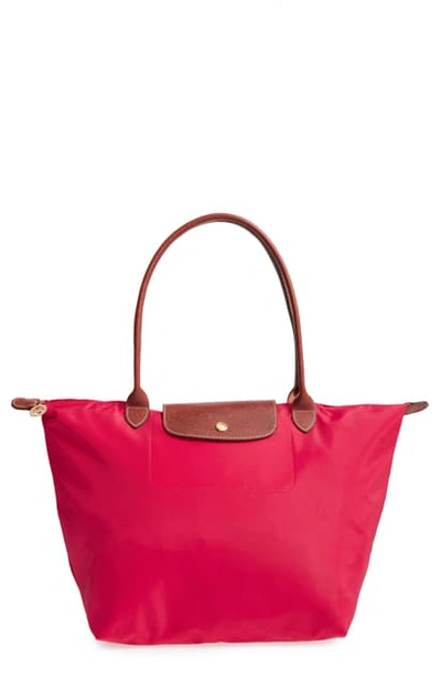 Shop Longchamp Large Le Pliage Tote - Red In Fig