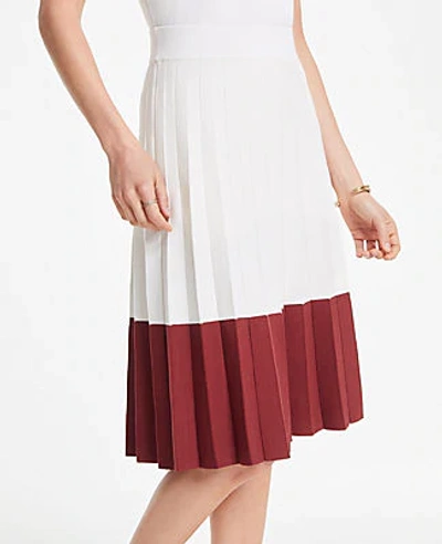 Shop Ann Taylor Petite Colorblock Pleated Sweater Skirt In Winter White