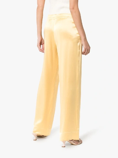 Shop Asceno Silk Pyjama Trousers In Yellow