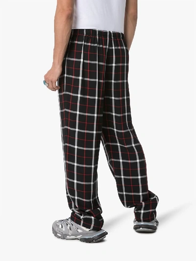 Shop Balenciaga Checked Wide Leg Pyjama Trousers In Black