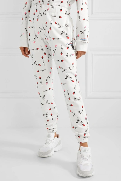 Shop Adam Selman Sport Floral-print Cotton-blend Fleece Track Pants In White