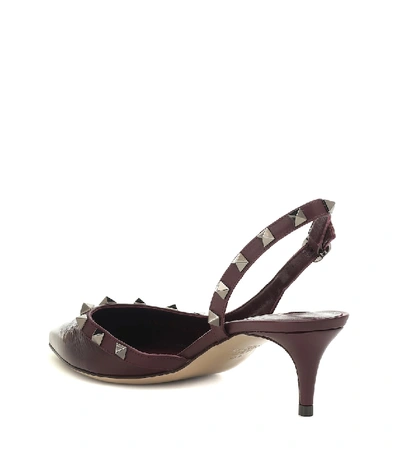 Shop Valentino Rockstud Patent Leather Pumps In Purple