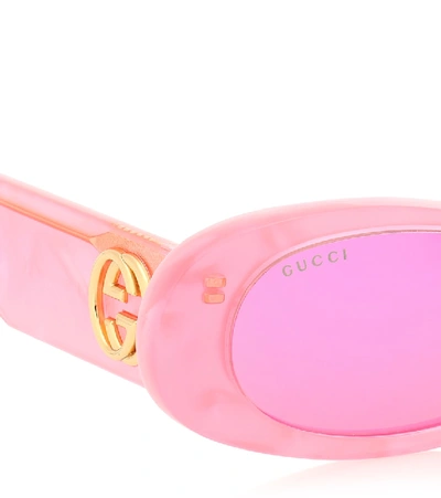 Shop Gucci Oval Sunglasses In Pink