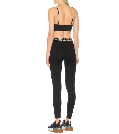 Shop Versace Technical Jersey Leggings In Black