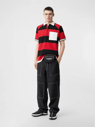 Shop Burberry Striped Cotton Piqué Oversized Polo Shirt In Black/bright Red