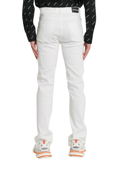 Shop Balenciaga Stretch Jeans With Frayed Hem In Bianco