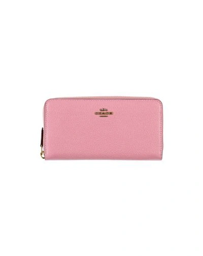 Shop Coach Wallet In Pink