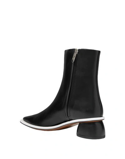 Shop Neous Ankle Boots In Black