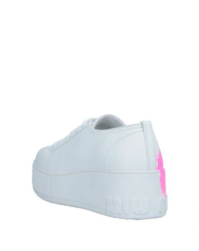 Shop Miu Miu Sneakers In White