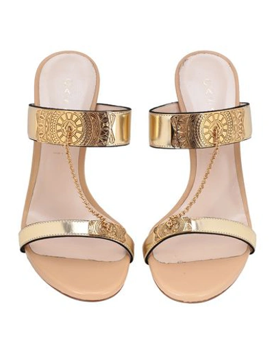 Shop Casadei Sandals In Gold