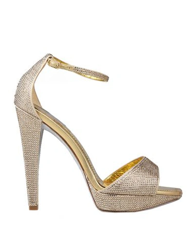 Shop René Caovilla Sandals In Gold