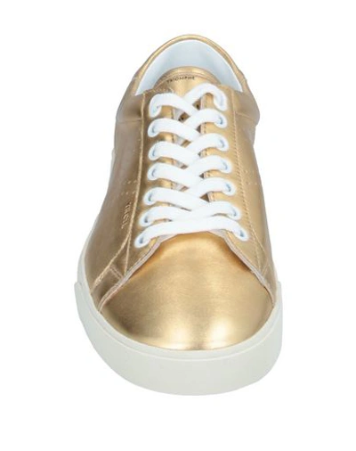 Shop Celine Sneakers In Gold